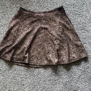 gold and black skater skirt